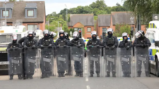 A line of riot police