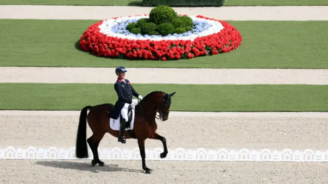 Carl Hester and horse Fame of Team Great Britain compete in the Dressage Individual Grand Prix Freestyle