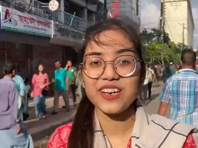 Fatima, a 17-year-old protester in Dhaka, talks to the BBC