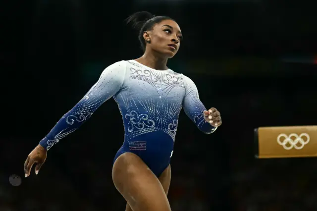 Simone Biles in action in the women's beam final at the 2024 Paris Olympics