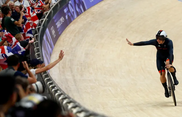 Katy Marchant of Britain waves to supporters after a world record sprint