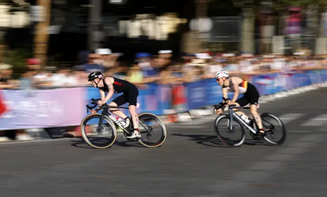 Samuel Dickinson of Britain and Lasse Luehrs of Germany in action