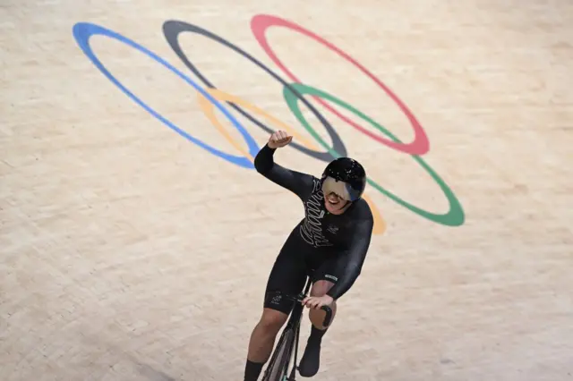 New Zealand rider fist pumps to celebrate a world record time