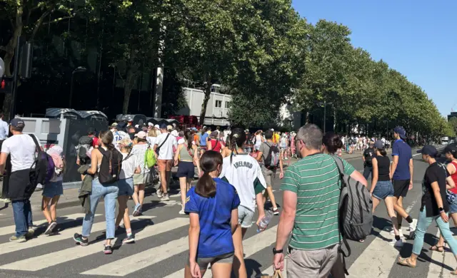 Fans walking to Stade de France