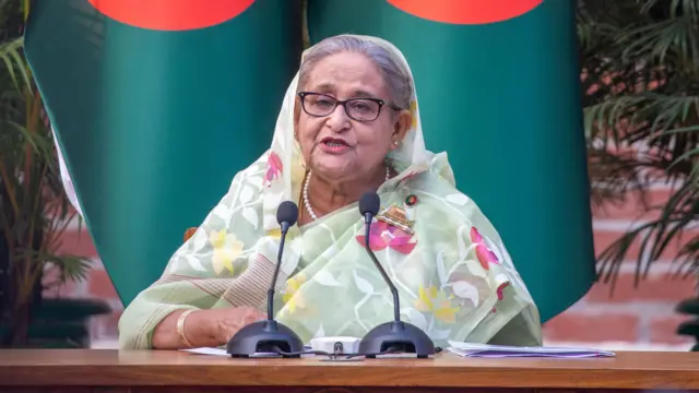 Bangladesh Prime Minister Sheikh Hasina addresses a meeting with foreign observers and journalists in Dhaka, Bangladesh,