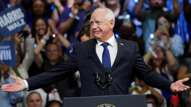 Description Minnesota Governor and Democratic vice presidential candidate Tim Walz, reacts during a campaign rally in Philadelphia, Pennsylvania, U.S., August 6, 2024.