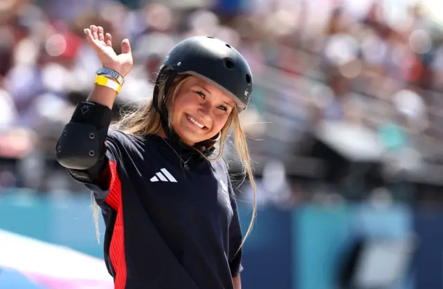 Sky Brown waves to the crowd at the 2024 Paris Olympics