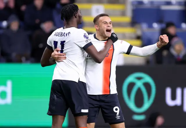 Carlton Morris celebrates with Elijah Adebayo after scoring for Luton Town