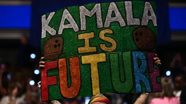 A supporter of US Vice President and 2024 Democratic presidential candidate Kamala Harris holds a sign before she speaks at Temple University's Liacouras Center in Philadelphia, Pennsylvania, August 6, 2024, on the first day of the "Battleground State Tour".