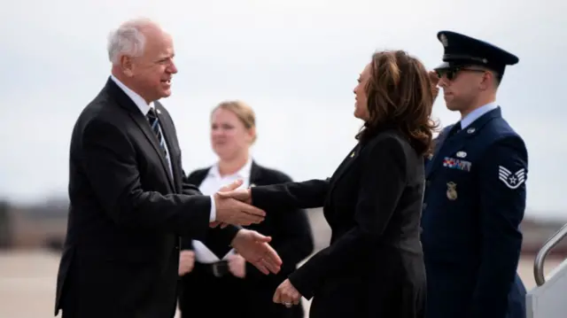 Walz and Harris shaking hands