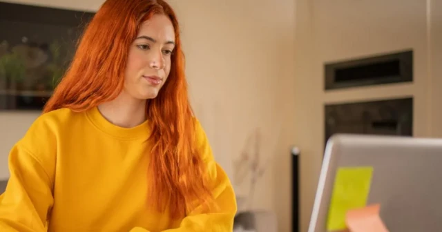 a student at a laptop