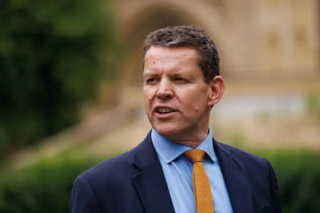 Rhun ap Iorwerth in a suit and tie