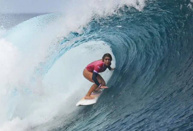 Caroline Marks surfing