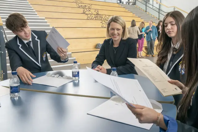 Education Secretary Jenny Gilruth meets with students at Madras College in St Andrews, Fife, as they receive their SQA results