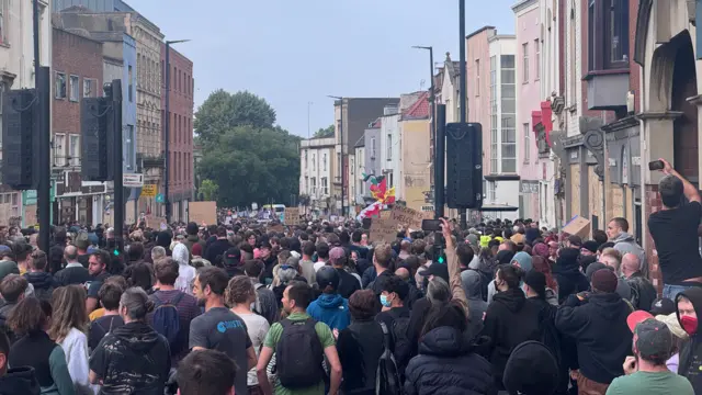 Group of protesters standing in street