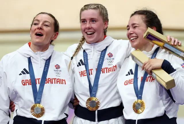 Katy Marchant of Britain, Sophie Capewell of Britain and Emma Finucane of Britain celebrate on the podium