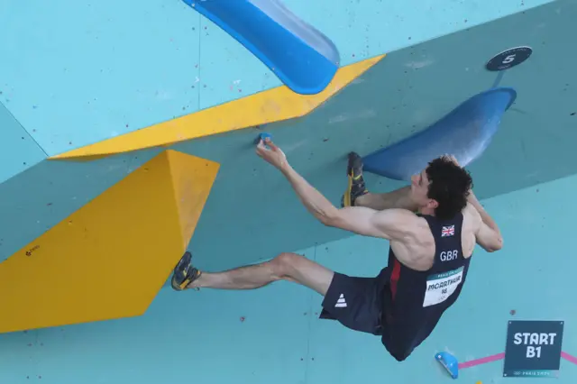 Great Britain's Hamish McArthur on the climbing wall