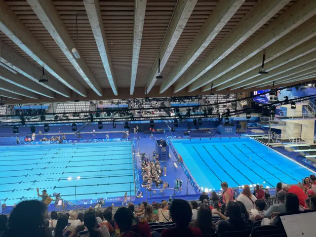 Diving pool next to artistic swimming pool