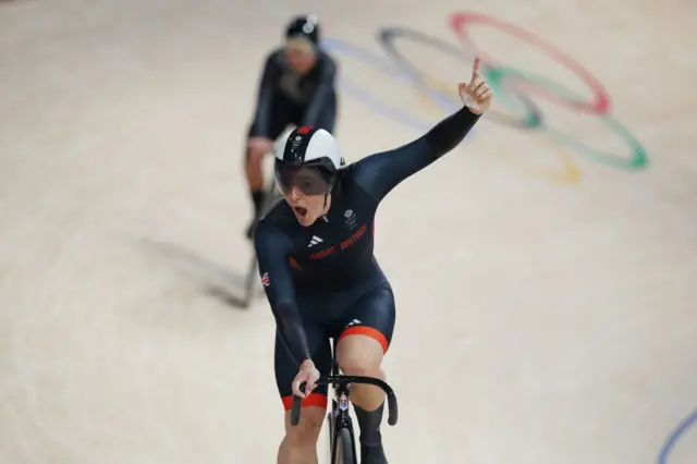 Great Britain's Katy Marchant celebrating with her hand in the air