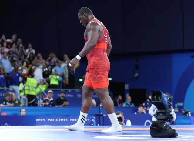 Mijain Lopez leaving his boots in the ring