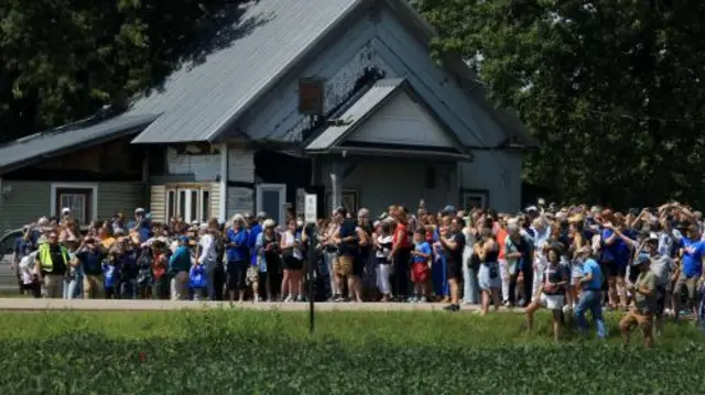 Supporters watch Harris-Walz motorcade in Eau Claire, Wisconsin