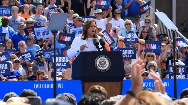 U.S. Vice President and Democratic presidential candidate Kamala Harris speaks during a campaign event with her running mate Minnesota Governor Tim Walz in Eau Claire, Wisconsin, U.S., August 7, 2024.