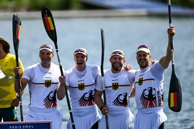 Gold medalists Max Rendschmidt, Max Lemke, Jacob Schopf and Tom Liebscher-Lucz of Germany celebreate after the Men's Kayak Four 500m Final