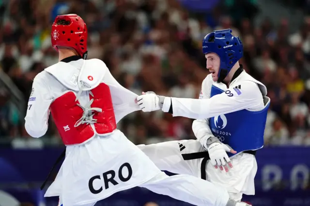 Great Britain's Bradly Sinden (right) and Croatia's Marko Golubic
