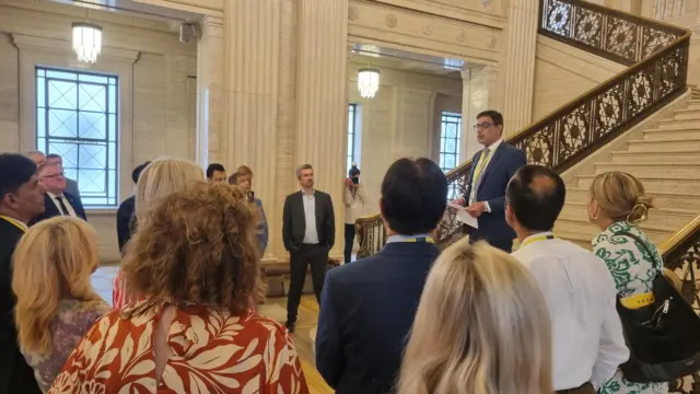 Muhammad Atif from the Belfast Multi-cultural Association address politicians in Stormont great hall
