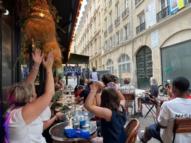 French fans watch basketball