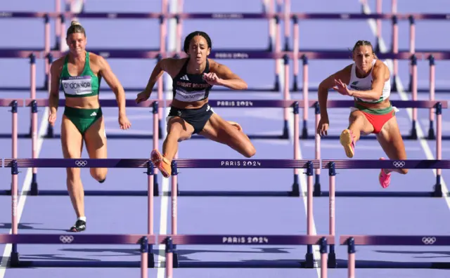 Katarina Johnson-Thompson of Team Great Britain (C) competes Women's Heptathlon 100m Hurdles on day thirteen of the Olympic Games Paris 2024