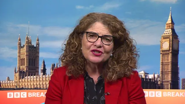 Diana Johnson wearing a red jacket and speaking via video to BBC Breakfast