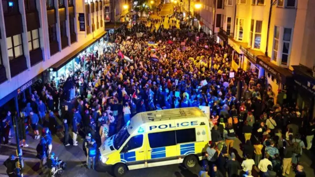 Crowds of people packed the streets in Brighton, with police at the scene