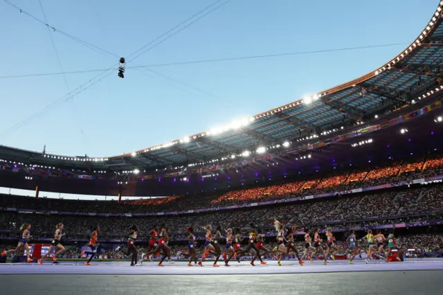 A general view of athletes competing in the Women's 10,000m Final