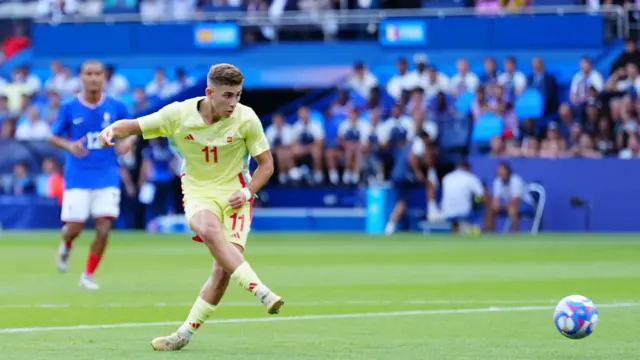 Fermin Lopez scores for Spain against France during the men's football final at the Paris 2024 Olympics