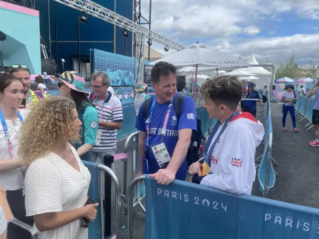 Toby Roberts with his parents