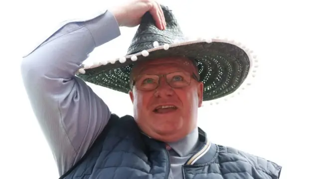 Rotherham boss Steve Evans wears a sombrero