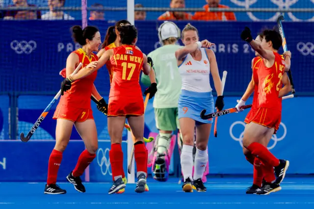 China celebrate hockey goal