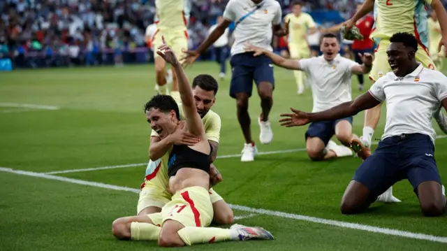 Sergio Camello celebrates after scoring for Spain against France in the men's football final at the 2024 Paris Olympics