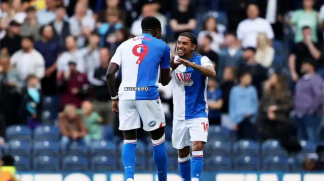 yrhys Dolan of Blackburn Rovers celebrates scoring his team's first goal with team mate Makhtar Gueye during the Sky Bet Championship match between Blackburn Rovers FC and Derby County FC at Ewood Park