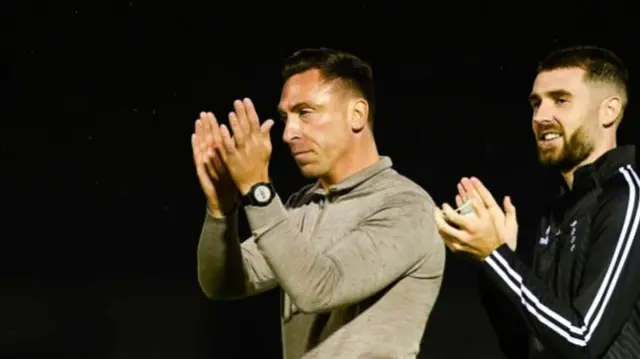 Ayr's Ben Dempsey and Head Coach Scott Brown appluad fans at full time during a William Hill Championship match between Ayr United and Airdrieonians at Somerset Park, on August 09, 2024, in Ayr, Scotland. (Photo by Rob Casey / SNS Group)