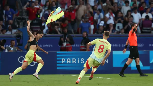 Sergio Camello celebrates after scoring for Spain against France in the men's football final at the 2024 Paris Olympics