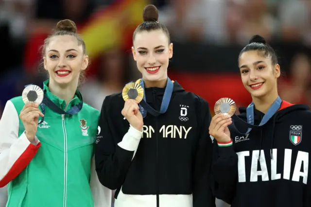 Gold medalist Darja Varfolomeev of Team Germany (C), Silver medalist Boryana Kaleyn of Team Bulgaria (L) and Bronze medalist Sofia Raffaeli of Team Italy (R)