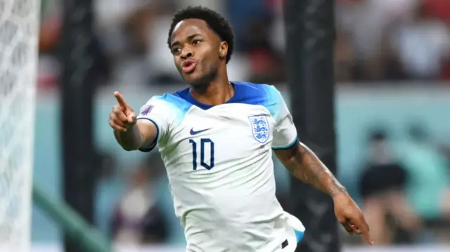 Raheem Sterling celebrates scoring for England