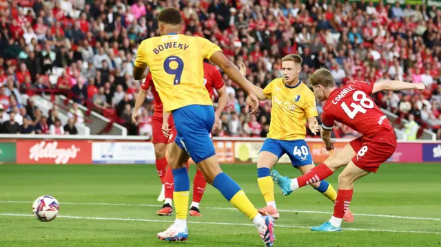 Luca Connell of Barnsley scores a goal to make it 1-2 against Mansfield