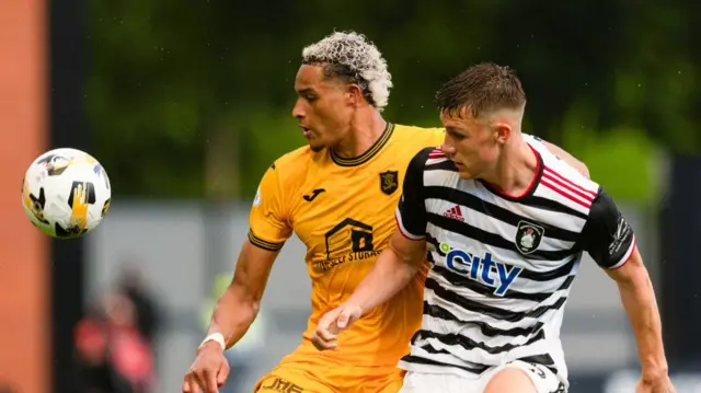 Livingston's Tete Yengi and Queen's Park's Dane Murray in action during a William Hill Championship match between Queen's Park and Livingston at The City Stadium, on August 09, 2024, in Glasgow, Scotland. (Photo by Craig Foy / SNS Group)