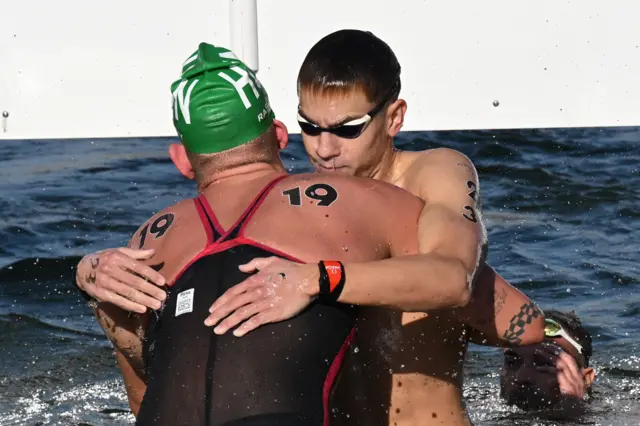 Kristof Rasovszky of Hungary celebrates after winning gold with bronze medallist David Betlehem of Hungary.