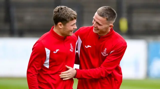 Airdrie's Aaron Reid (L) and Dylan McDonald (R) pre-match during a William Hill Championship match between Ayr United and Airdrieonians at Somerset Park, on August 09, 2024, in Ayr, Scotland. (Photo by Rob Casey / SNS Group)