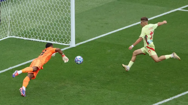 Fermin Lopez scores for Spain against France during the men's football final at the Paris 2024 Olympics