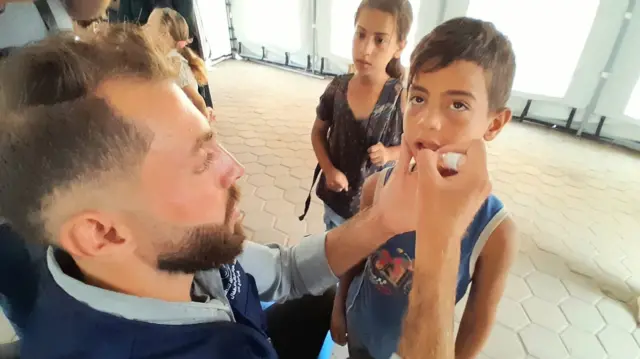 Child being vaccinated against polio